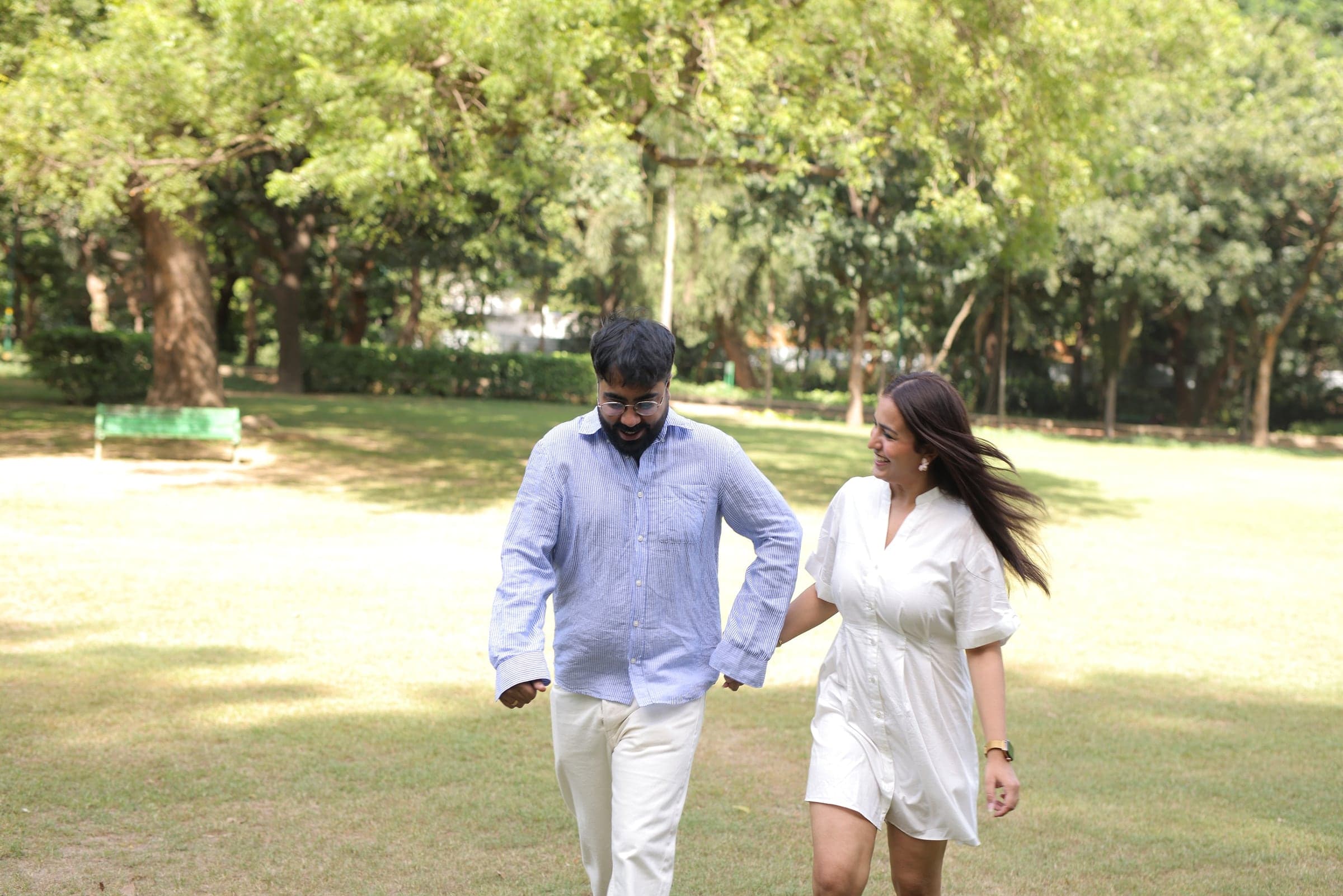 Disha and Mayank running across a lawn